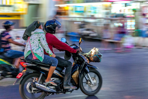 Picture of a couple riding a motorcycle