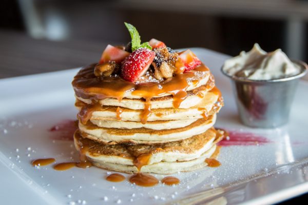 Picture of a stacked pancake dish on a table